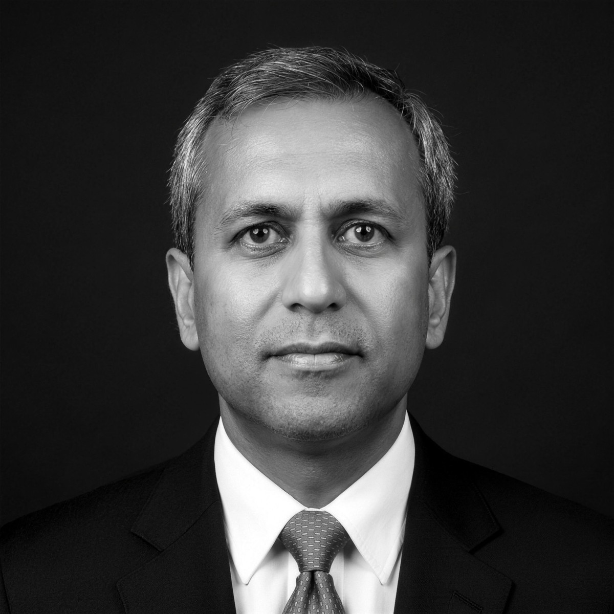 Dr. Fayaz Ahmed, Managing Director of ATHEER PHARMA — black-and-white portrait
